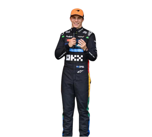 Person wearing a racing suit with various sponsor logos on a white background