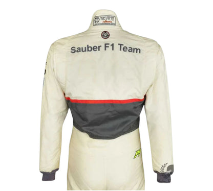 White racing suit with 'Sauber F1 Team' branding on a white background