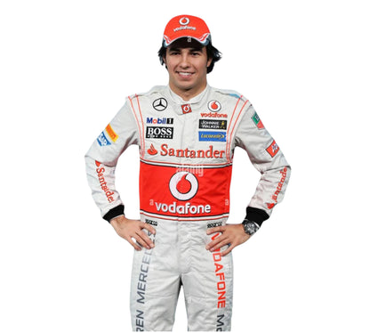 Person wearing a Formula 1 racing suit with various sponsor logos on a white background