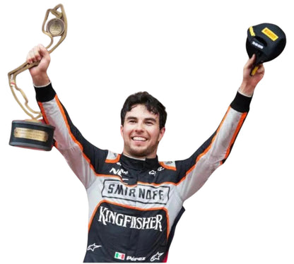 Person in racing suit holding a trophy and a helmet against a white background