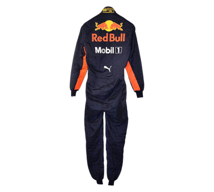 Navy racing suit with Red Bull and Mobil logos on a white background