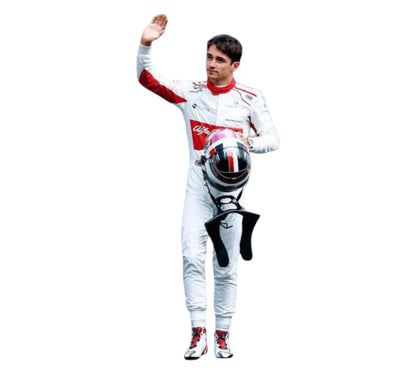 Racing driver in a white and red suit holding a helmet on a white background