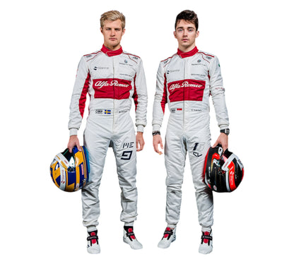 Two individuals in Alfa Romeo racing suits holding helmets on a white background