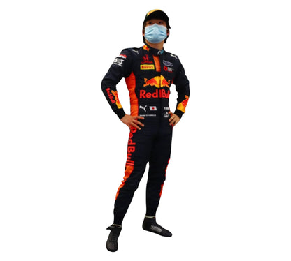 Person wearing a Red Bull racing suit on a white background