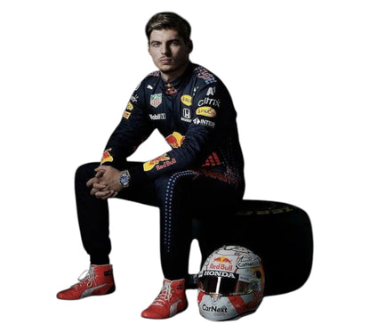 Person in racing suit with helmet and tire on a white background