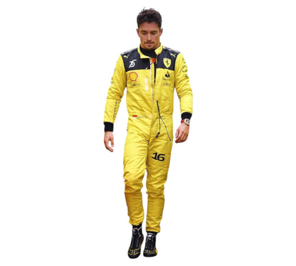 Person wearing a yellow racing suit with sponsor logos on a white background