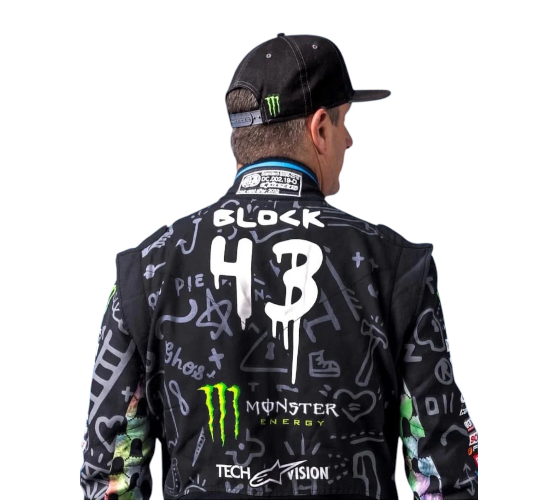 Person wearing a black jacket with graphics and branding, including 'Monster Energy' and 'Tech Vision'.