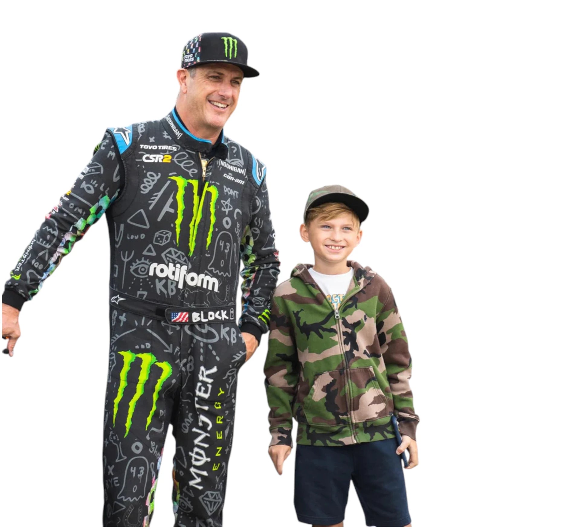 Man wearing a racing suit with Monster Energy branding and a child in a camouflage hoodie and cap.
