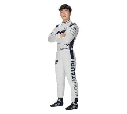 Person wearing a white racing suit with AlphaTauri branding on a white background