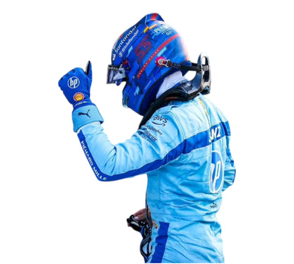 Person in a blue racing suit and helmet on a white background