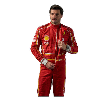 Person wearing a red racing suit with various sponsor logos on a white background