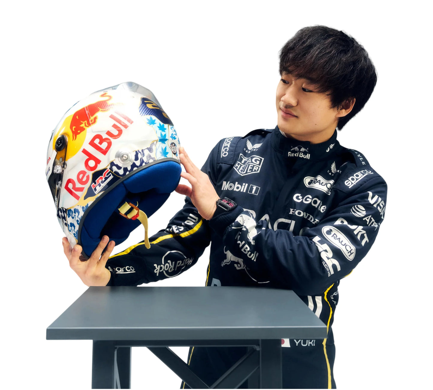 Person holding a colorful helmet with visible branding