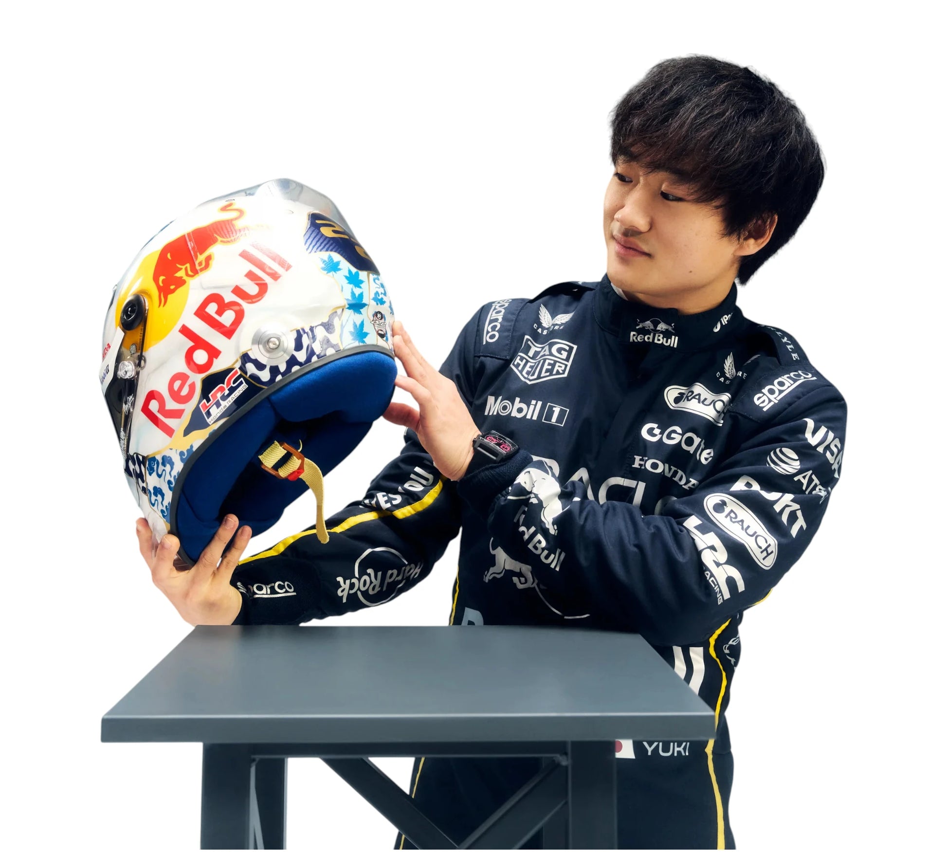 Person holding a colorful helmet with visible branding
