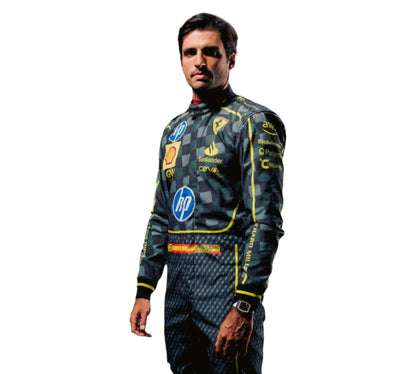 Person wearing a checkered racing suit with various sponsor logos on a white background