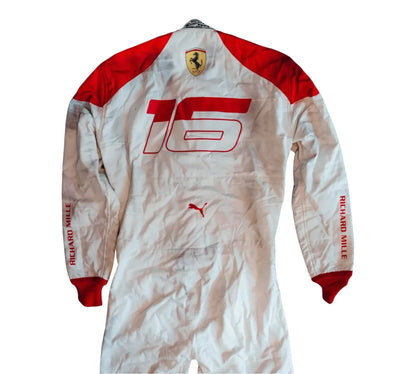 White racing suit with red accents and Ferrari logo on a white background