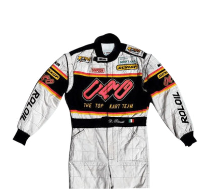 White racing suit with black and red accents featuring various sponsor logos on a white background