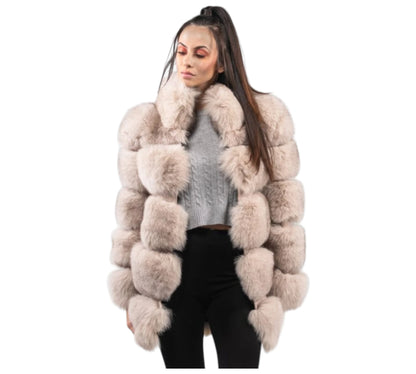 Woman wearing a fur coat with a white background