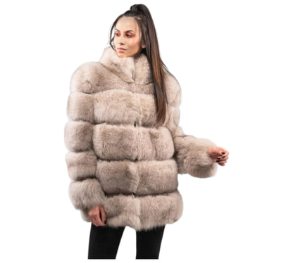 Woman wearing a fur coat on a white background