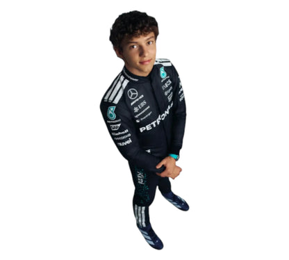 Child wearing a Formula 1 themed outfit with visible branding on a white background