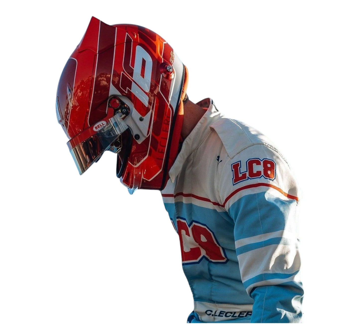 Person wearing a red and white helmet and a blue and white racing suit with 'LCA' branding on a white background