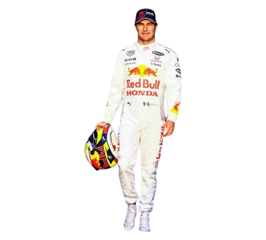 Person wearing a Red Bull racing suit holding a helmet on a white background