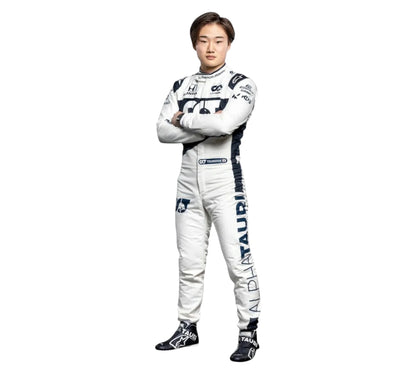 Person wearing a white racing suit with black accents on a white background